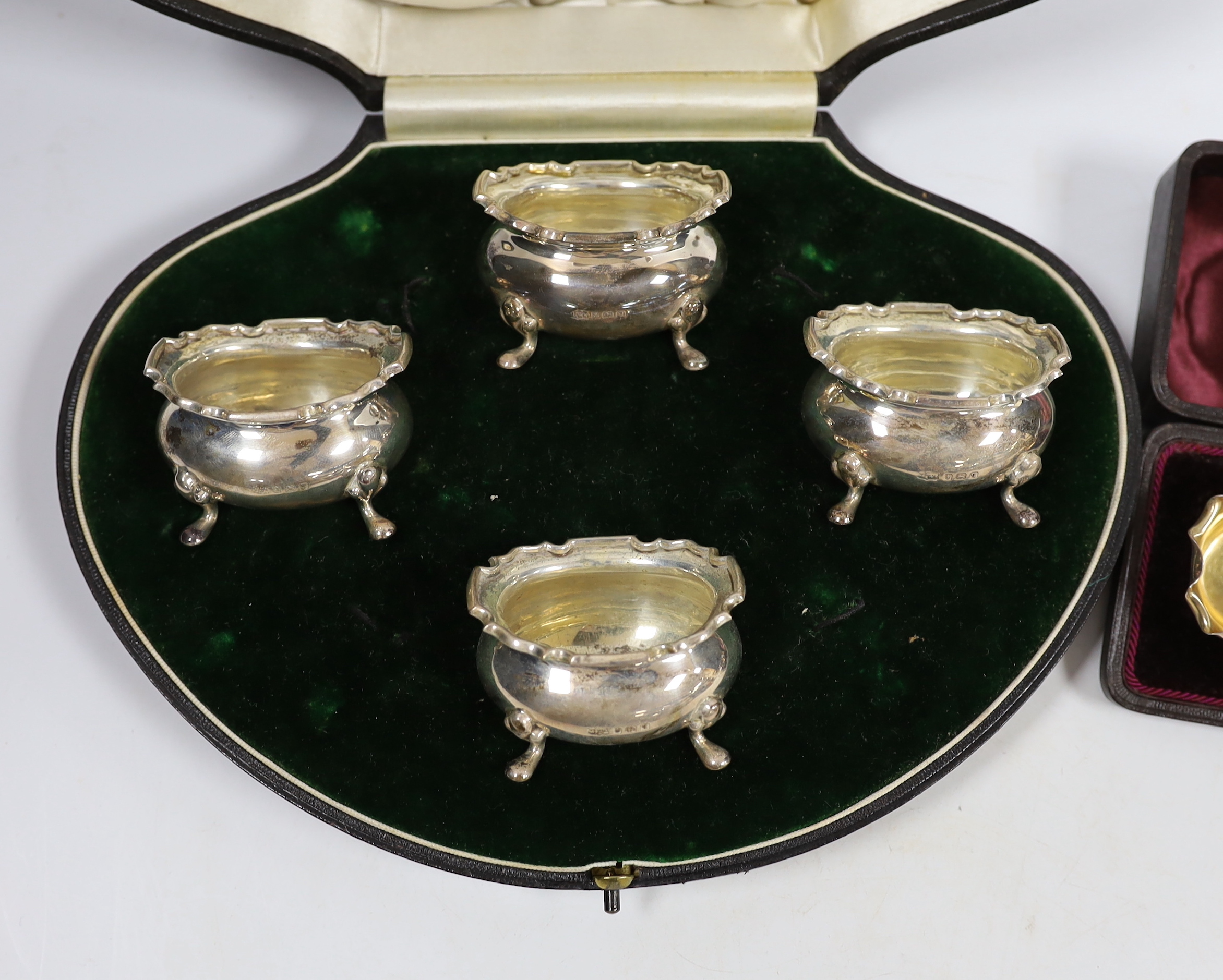 A cased set of four George V silver salts by Mappin & Webb, Birmingham, 1915, no spoons, together with a cased pair of late Victorian silver salts with spoons, Deakin & Francis, Birmingham, 1892.